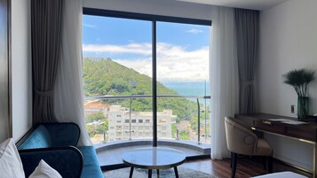 Deluxe Double Room, 1 King Bed, Partial Ocean View | Premium bedding, free minibar items, individually decorated