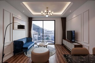 Apartment, Mountain View | Living area | Flat-screen TV