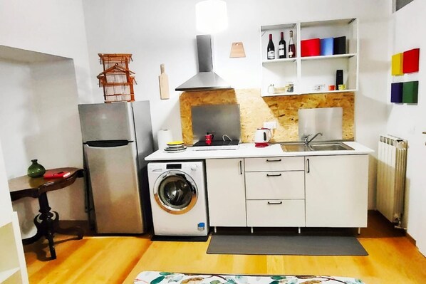 Fridge, stovetop, dining tables