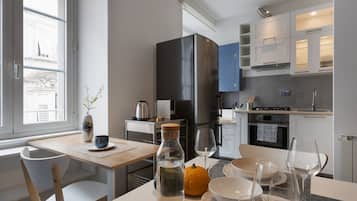 Fridge, oven, electric kettle, cookware/dishes/utensils