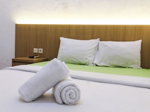 Habitación Deluxe doble | Ropa de cama