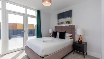 ดีลักซ์อพาร์ทเมนท์, 2 ห้องนอน | 2 ห้องนอน, เตารีด/โต๊ะรีดผ้า, Wi-Fi ฟรี, ผ้าปูที่นอน