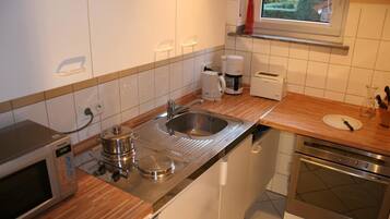 Fridge, microwave, stovetop, high chair