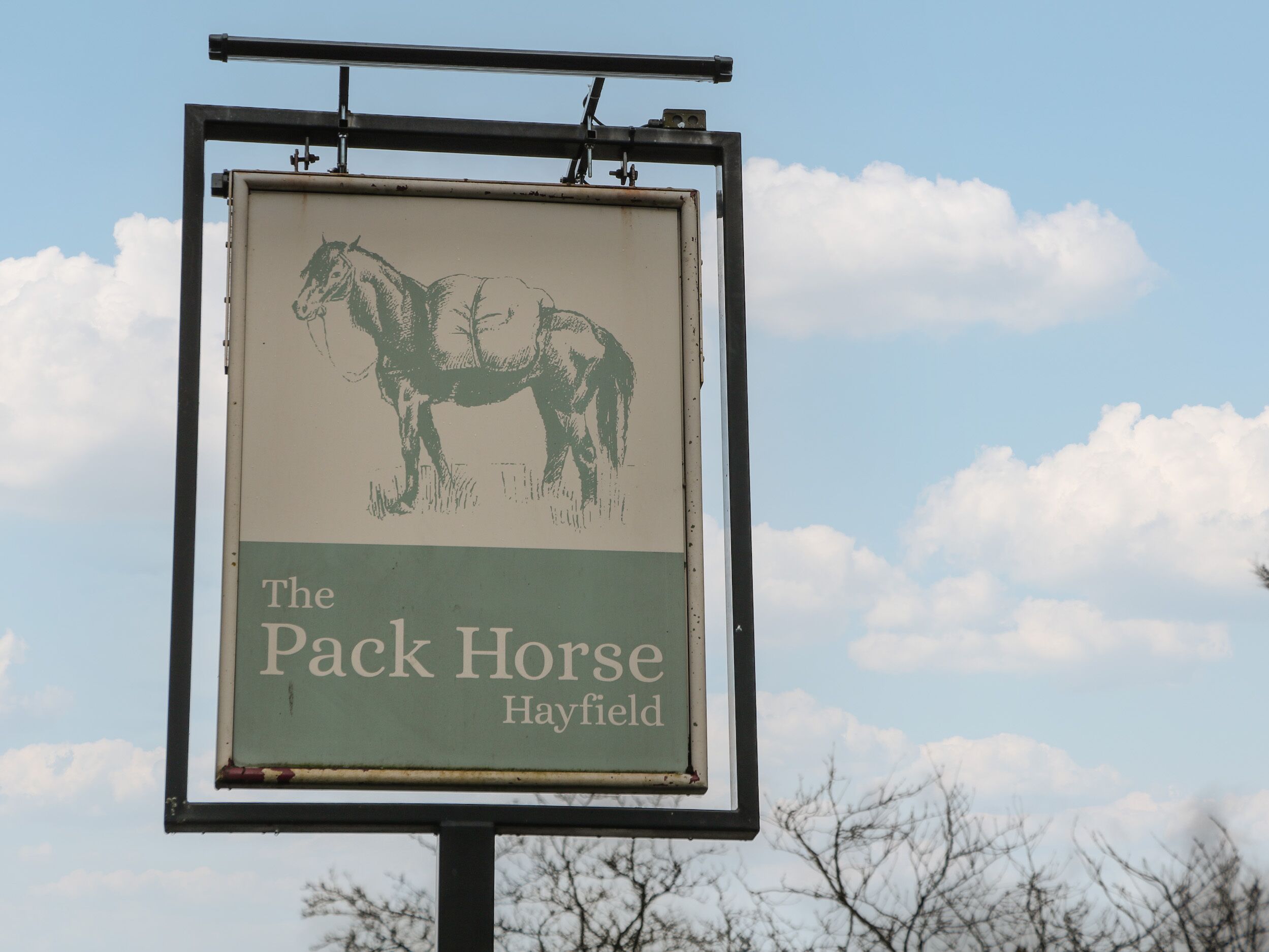 A sign for The Pack Horse Hayfield.