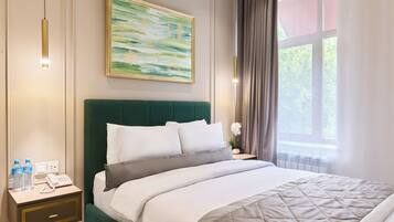 Deluxe Double Room, City View | In-room safe, individually decorated, desk, laptop workspace