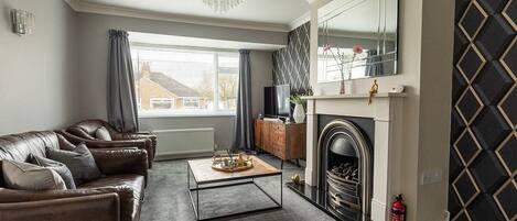 TV, caminetto, studio