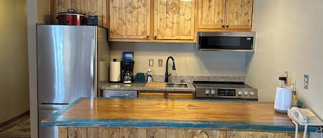 Oven, stovetop, dishwasher, coffee/tea maker