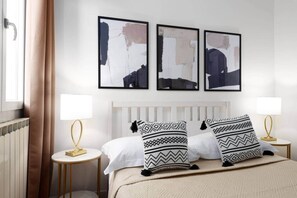2 habitaciones, tabla de planchar con plancha, wifi y ropa de cama 
