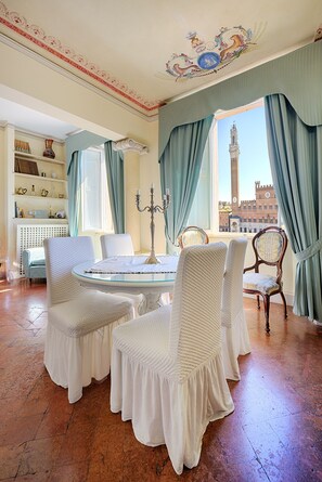 Deluxe Apartment, City View | Living area | 24-inch flat-screen TV with digital channels, TV - Palazzo Lenzi (Siena)