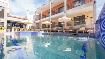 Seasonal outdoor pool, pool umbrellas, sun loungers