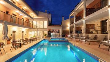 Seasonal outdoor pool, pool umbrellas, sun loungers