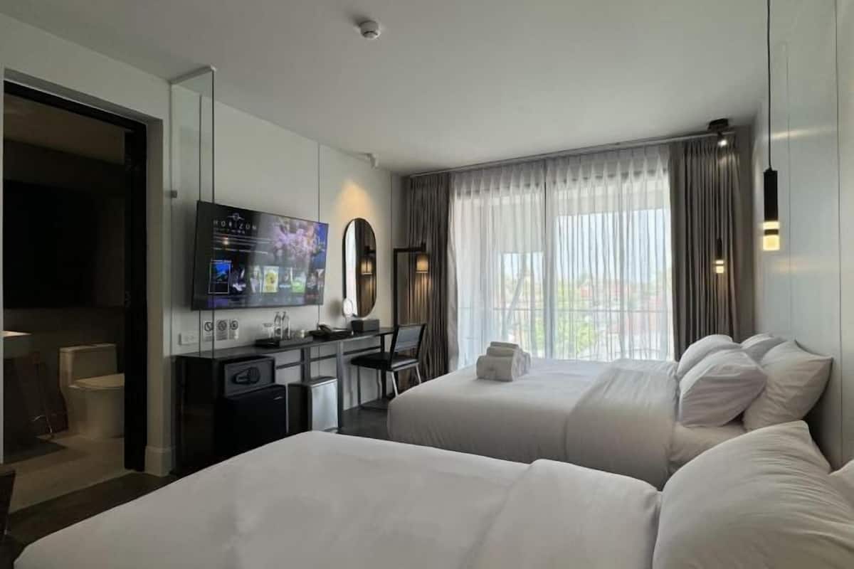 Minibar (free items), in-room safe, desk, laptop workspace