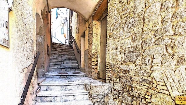 A stone staircase leading up to a building entrance. - B&B Black & White (Pietramontecorvino)