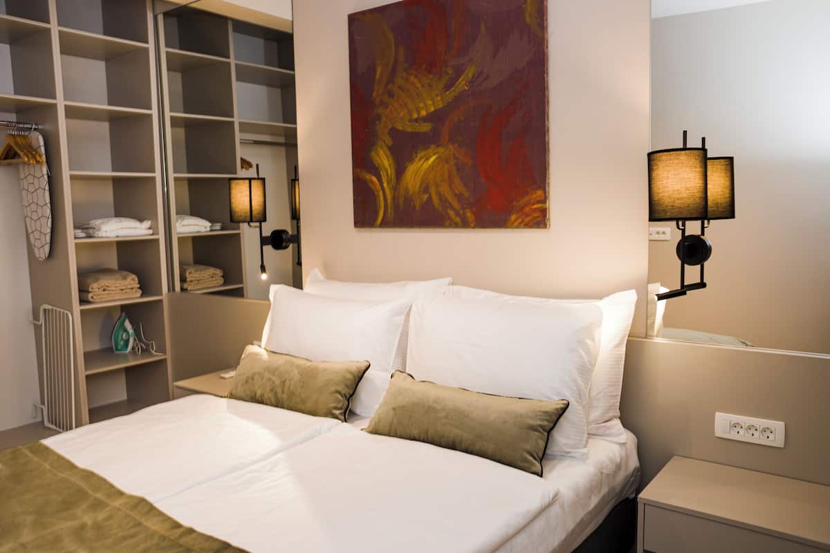 Apartment, 1 Bedroom, Sea View | Soundproofing, iron/ironing board, WiFi (free), bed sheets