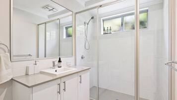 Shower, hair dryer, towels