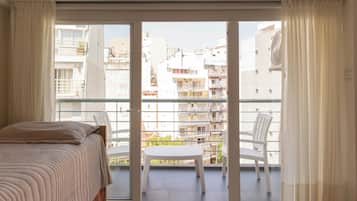 Duplex, 1 Bedroom | Living area | 32-inch LCD TV with cable channels