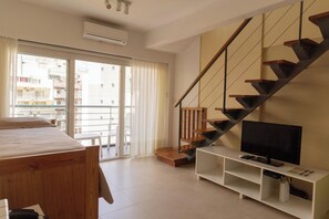 Duplex, 1 Bedroom | Living area | 32-inch LCD TV with cable channels