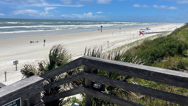 A beach with a wooden boardwalk leading to the shore, a sandy beach, and the ocean. - Direct Oceanview Premium Flat with 2 Bed/2 Bath +Murphy Bed. Just Renovated! (St. Augustine)