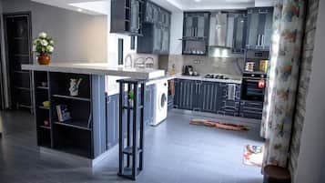 Coffee/tea maker, electric kettle, dining tables