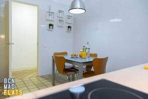 Enjoy meals in the comfort of your room at this hotel, where a dining table and chairs await.