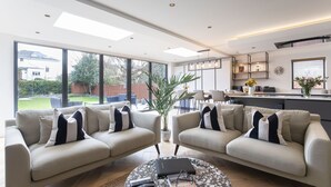 House | Living area | 50-inch Smart TV with digital channels, Netflix, heated floors - Elliot Oliver- Superior 6 Bedroom House With Hot Tub And Log Burner (Cheltenham)