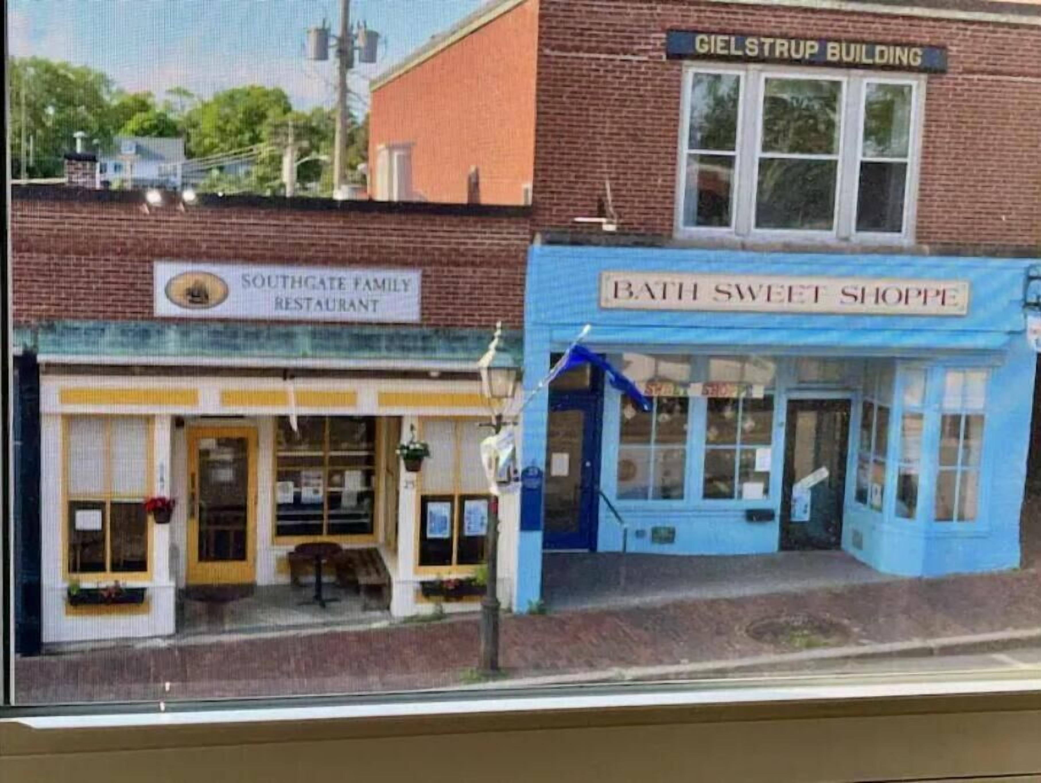 A Southgate Family Restaurant and Bath Sweet Shoppe on a street corner.