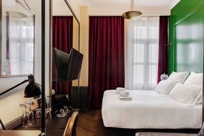 Premium bedding, down duvets, pillow-top beds, in-room safe