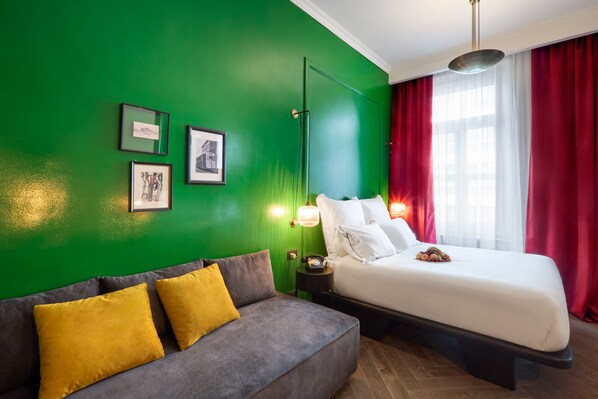 Premium bedding, down duvets, pillow-top beds, in-room safe