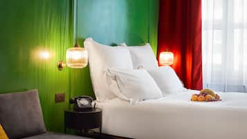 Premium bedding, down duvets, pillow-top beds, in-room safe