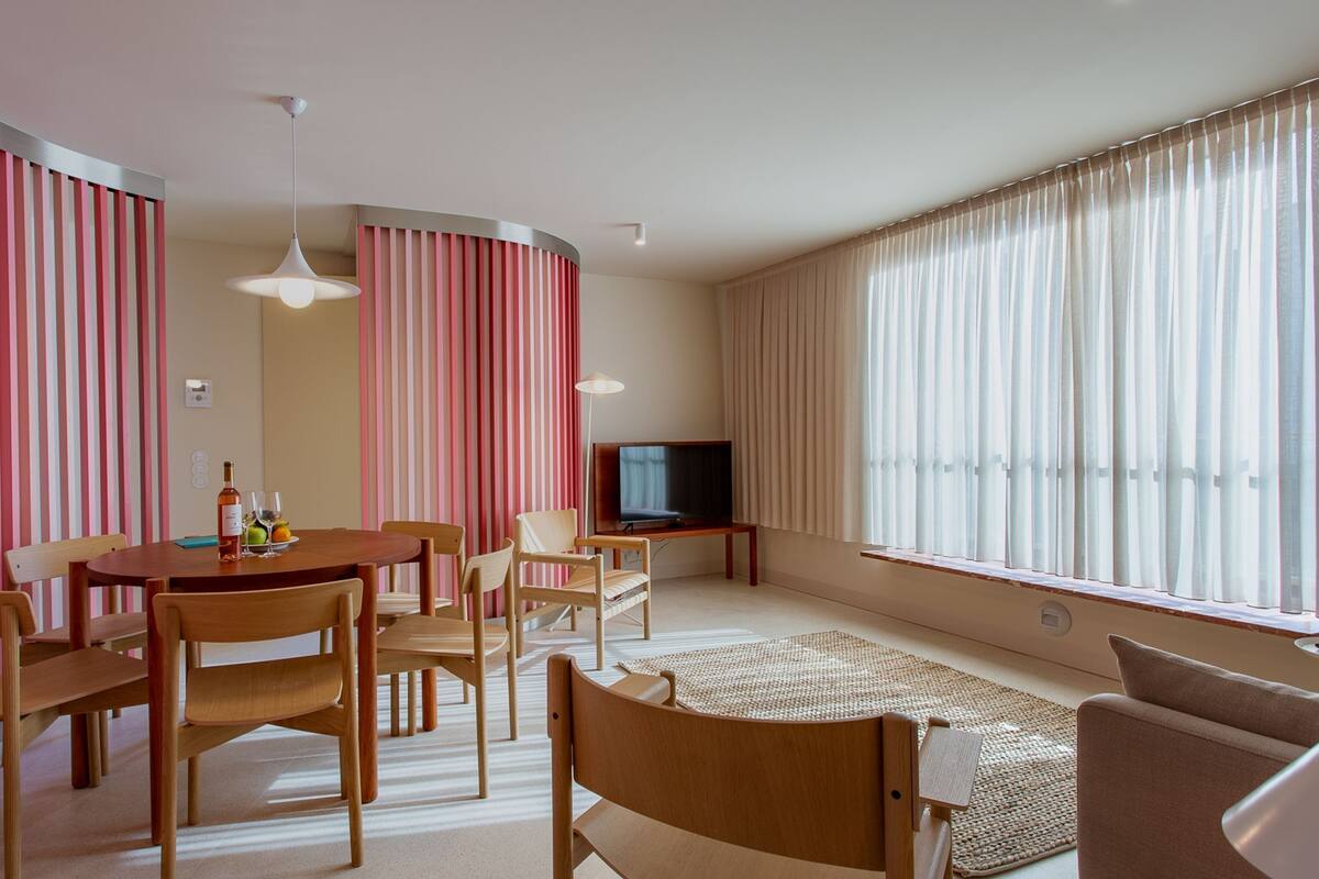 Family Apartment | Living area | 40-inch flat-screen TV with cable channels