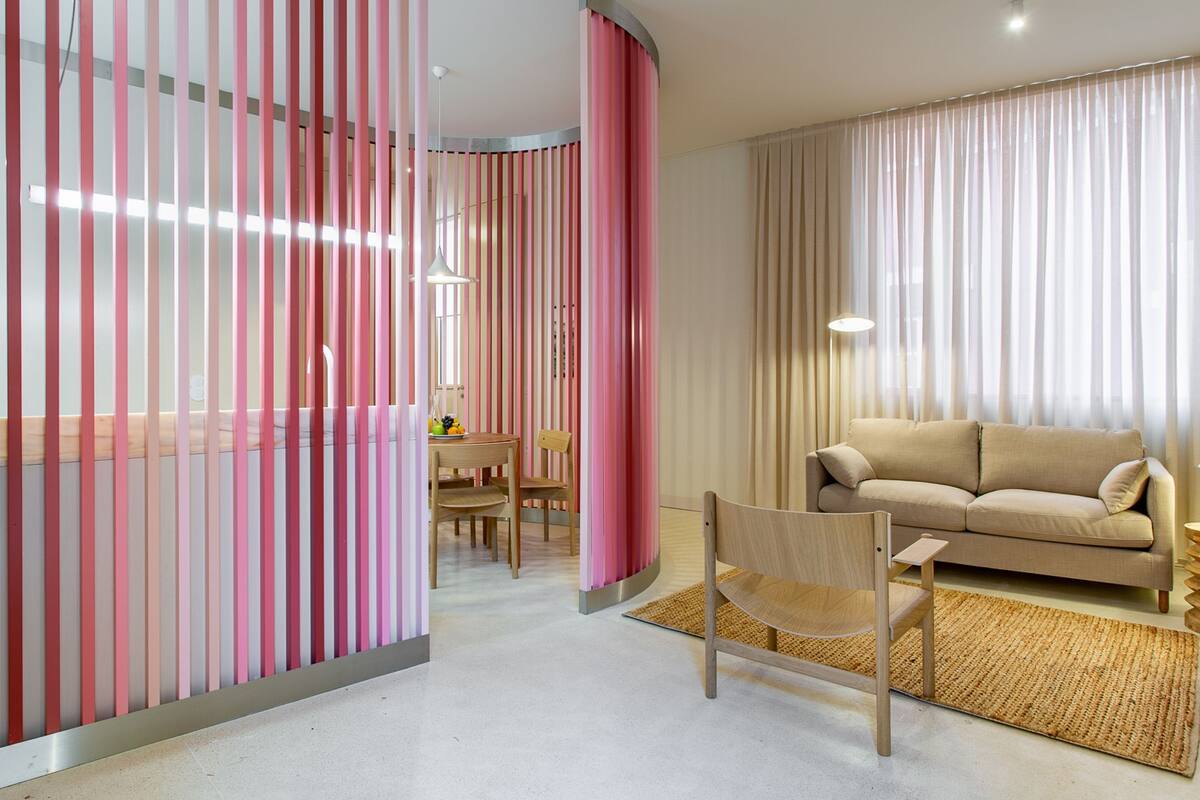 Family Apartment | Living area | 40-inch flat-screen TV with cable channels
