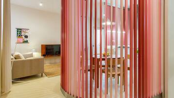 Family Apartment | Living area | 40-inch flat-screen TV with cable channels