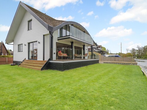 This stunning waterside home offers an amazing space for families and friends.