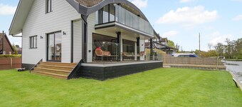 This stunning waterside home offers an amazing space for families and friends.