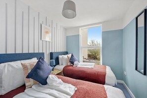 2 habitaciones, tabla de planchar con plancha, wifi y ropa de cama 