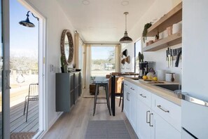 Fridge, stovetop, coffee/tea maker, electric kettle