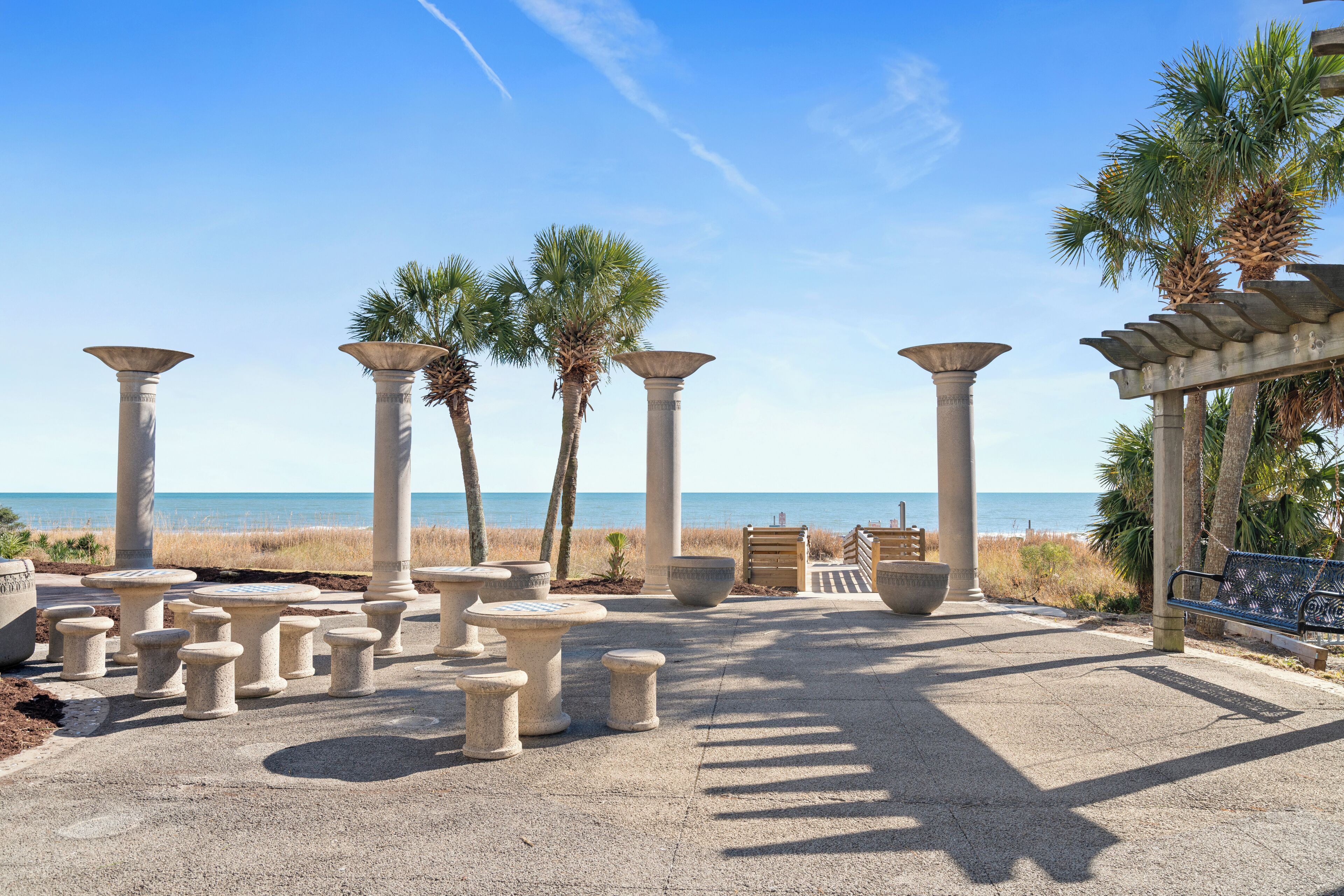 Beach nearby, white sand, beach towels