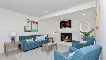 Suite | Área de sala de estar | Smart TV y futbolito