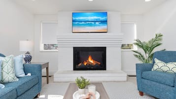 Two Bedroom Suite, Full Kitchen & Private Bath | Living area | Smart TV, foosball