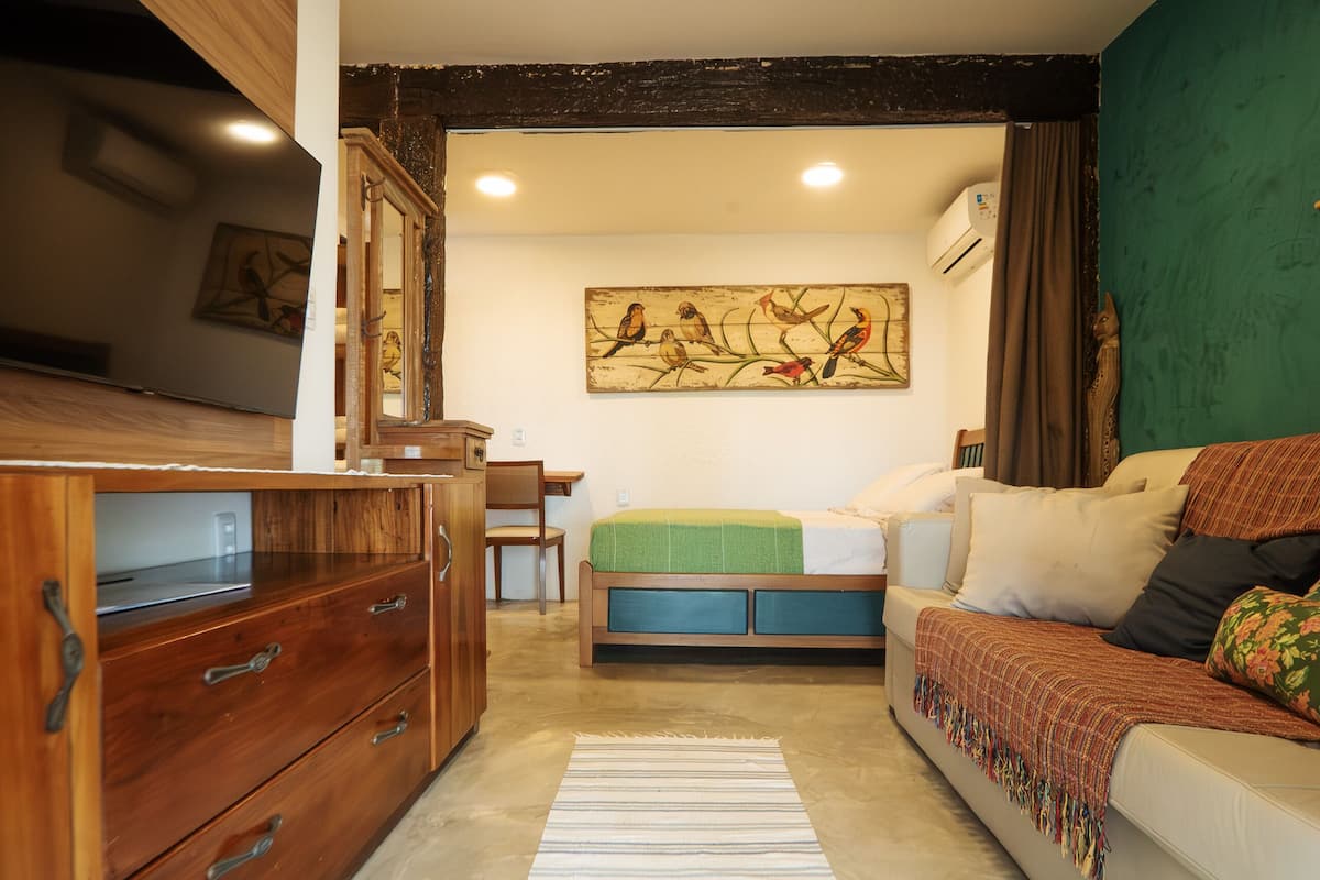 Habitación estándar | 3 dormitorios, cortinas opacas, tabla de planchar con plancha