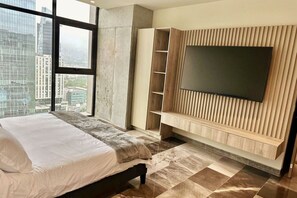 2 dormitorios, tabla de planchar con plancha, cuna de viaje y wifi