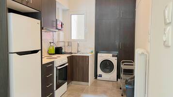 Apartment | Private kitchen | Fridge, microwave, oven, stovetop