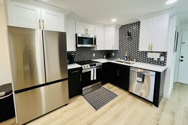 Coffee/tea maker, fridge, microwave, oven
