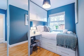 4 bedrooms, iron/ironing board, travel cot, WiFi