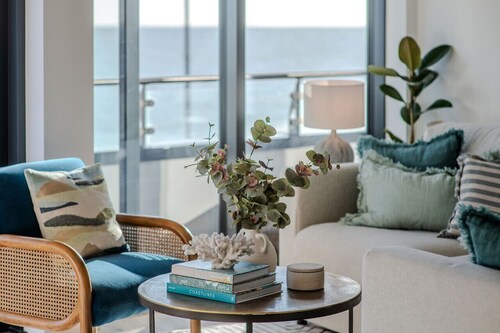 Stunning Beach Front Apartment with secure Parking