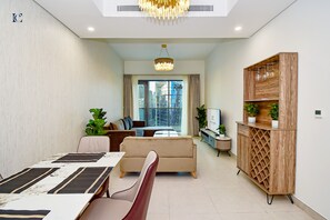 TV, fireplace - Stylish 1BR with Downtown Skyline View - THE BAY. (Dubai)