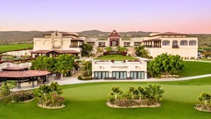 A golf academy with a large building, a covered pavilion, and well-maintained lawns. - 5-BR Luxury Golf Villa Retreat (Cabo San Lucas)