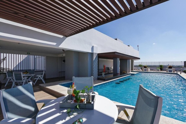 Outdoor pool, open 9:00 AM to 9:00 PM, sun loungers