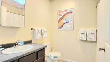 Hair dryer, towels, soap, shampoo