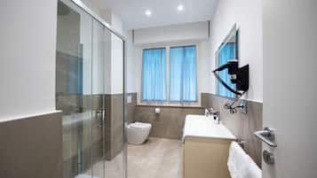 Douche, douche à « effet pluie », sÚche-cheveux, bidet
